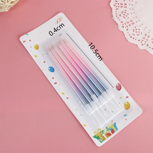 Pack of 6 pink and blue gradient pencil birthday candles with holders and festive packaging
