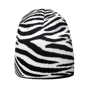 Unisex zebra striped knit beanie hat for winter warmth with black and white pattern