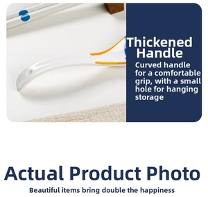 Macro view of thickened ceramic spoon handle with blue dots and round hanging hole