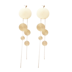 Long gold circular drop earrings with textured spiral discs and minimalist design