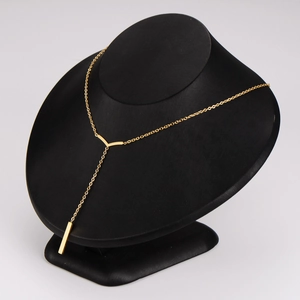 Minimalist gold stainless steel Y-necklace with geometric vertical bar pendant on a neck model