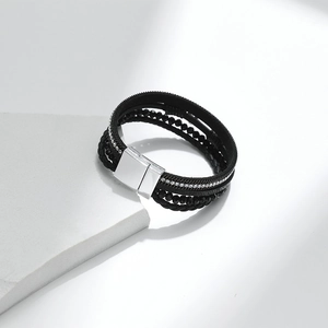 Detail of multi-layer black leather bracelet with crystal beads and square magnetic clasp