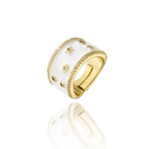 Macro detail of gold-plated star ring with white enamel and micro-set cubic zirconia