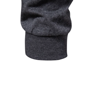 Close-up of ribbed cuffs on grey knit t-shirt showing detailed fabric texture