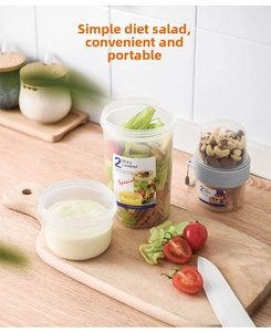 Close-up of dual-layer salad container with 760ml and 310ml compartments for fresh food