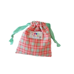 Small plaid drawstring storage bag in pink and green for makeup and travel essentials.