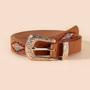 Brown leather belt with floral embroidery and engraved golden buckle on beige background