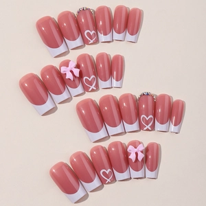 Pink French press-on nails with heart patterns, 3D bows, and rhinestones, 24-piece set