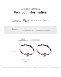 Detailed view of 3.5cm oval Saturn hoop earrings with silver needle and cubic zirconia