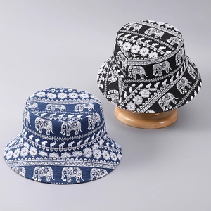 Detail of elephant pattern print on black and navy blue fisherman bucket hats