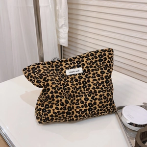 Vintage leopard print canvas makeup bag with a square zipper design and fabric label