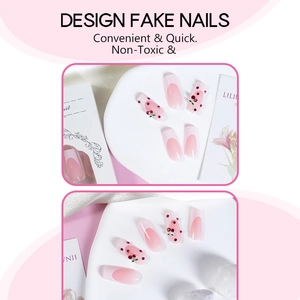 Pink French manicure press-on nails with red cherry charms and rhinestones