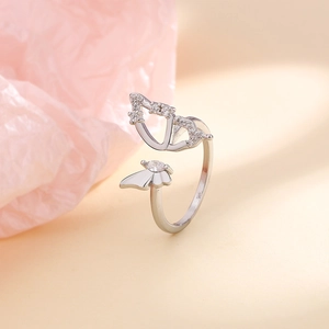 Detailed view of silver hollow butterfly ring featuring sparkling zircon stones