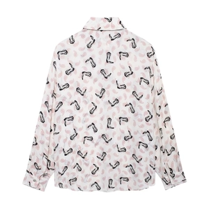 Women's vintage long sleeve shirt with pink paisley and black boot print on back view
