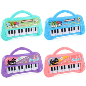 Piano electrónico portátil de 13 teclas para niños en cuatro colores pastel