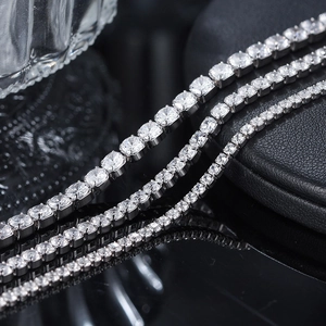 Macro view of S925 sterling silver tennis bracelets in four different widths with zircons
