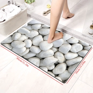 Close-up of 3D pebble print bath mat 80x50cm showing high absorption texture