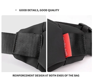 Close-up showing the reinforced stitching and red brand tag on a black mini crossbody bag