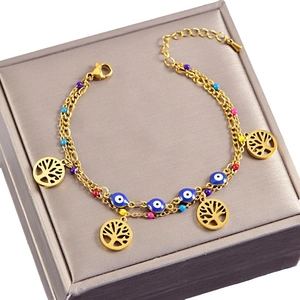 Gold double-layer stainless steel bracelet featuring Tree of Life and Blue Evil Eye charms