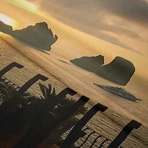Detail of bohemian tapestry texture showing a warm sunset sea with a modern cruise ship