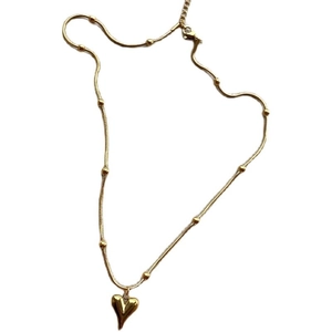 Minimalist 18k gold plated necklace featuring a heart pendant and delicate beaded chain