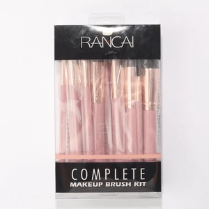 Detail of 16-piece pink and rose gold makeup brush set in clear portable storage box