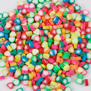 Macro shot of colorful heart-shaped polymer clay beads for DIY jewelry making