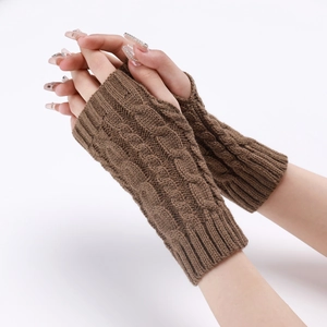 Close-up of coffee brown cable knit arm warmers showing texture and fingerless design