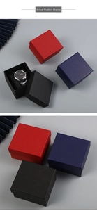 Detailed view of luxury square watch boxes in red, blue, and black with textured finish