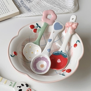 Cute ceramic bowl with pink checkered cherry patterns and matching artistic dessert spoons