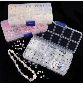 Close-up of 10-grid PP plastic storage box set with macaron glass beads for DIY crafts