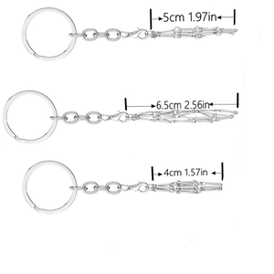 Three silver crystal holder keychains in different sizes with mesh cage pendants