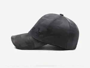 Detail of dark grey camo baseball cap with black 3D Classic embroidery on the side