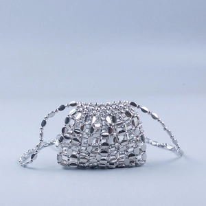 Handmade silver beaded crossbody bag with polished metallic oval acrylic sequins and metal texture