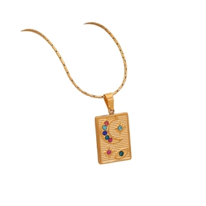 Gold star moon pendant necklace with colorful crystals on a sleek snake chain
