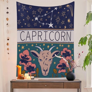 Detail of Capricorn zodiac tapestry featuring celestial patterns and bohemian room decor