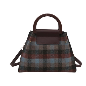 Vintage plaid wool handbag for women featuring a round handle and adjustable shoulder strap