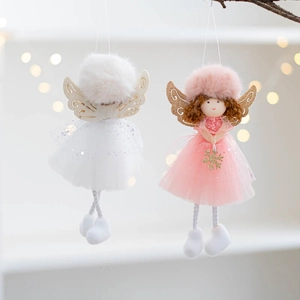 Christmas plush angel girl dolls with mesh skirts and sequin wings hanging on a tree