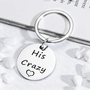 Polished stainless steel keychain with His Crazy engraving and heart pendant on white stones
