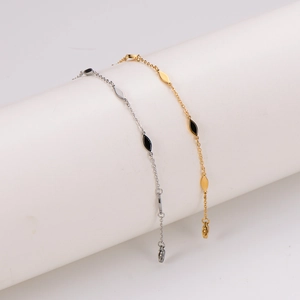 Minimalist stainless steel chain bracelet with black drop charms in gold and silver