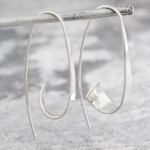 Gypsy spiral curved silver hoop earrings with polished geometric long hook design