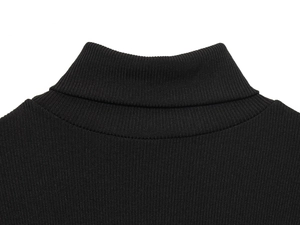 Close-up of black high-neck knit dress featuring detailed fine ribbing craftsmanship