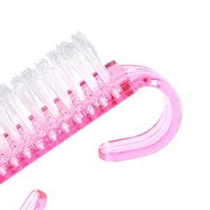 Rosa Nagelbürste mit ergonomischem Griff und weichen Borsten zur Reinigung von Nagelstaub