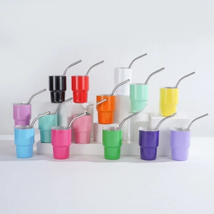 Detailed view of colorful 3oz stainless steel tumbler set with straws and lids