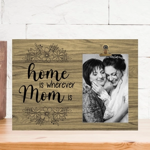 Detail of wooden photo holder with floral art and 'home is wherever Mom is' text