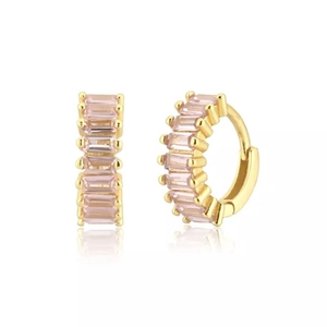 Detailed view of gold hoop earrings featuring rectangular pink gemstone pavé settings