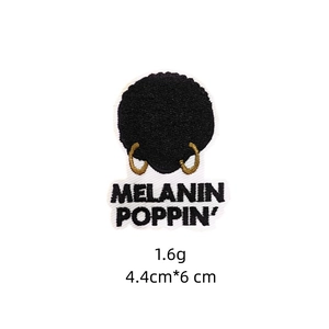 Detailed embroidery texture of Melanin Poppin Afro girl iron-on patch for clothing
