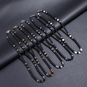 Handmade beaded necklaces with matte black stones, tiger eye and silver metal spacers