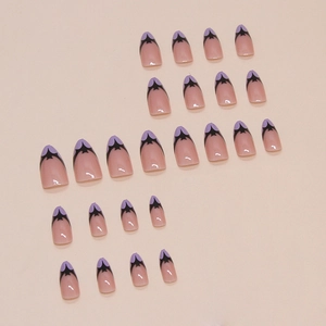 French style Halloween false nails with bat patterns and purple tips on pink base