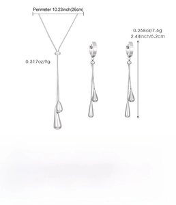 Detailed view of silver stainless steel teardrop pendant necklace and drop earrings set